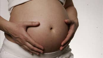 Surrogate carrying triplets sues to stop forced abortion