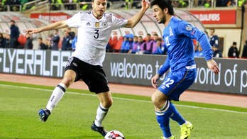 Germany, England, Poland stay on course in WCup qualifying