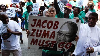 South Africa's ruling party confronts divide over Zuma