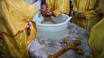 AP PHOTOS: Eritrean migrants find escape in Tel Aviv church
