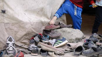 The Latest: EU told to admit more Turks or migrant deal dies