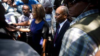 Lawyers: Attackers shoot at motorcade carrying Aristide