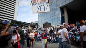 The Latest: Journalists blocked in Venezuela