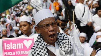 Indonesia hard-liners call for jailing of Christian governor
