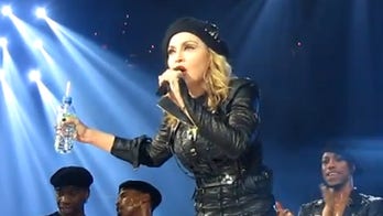 Madonna calls Obama a 'black Muslim,' says she'll strip onstage if he wins new term