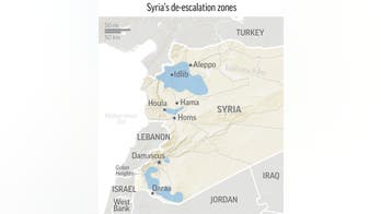Syrian rebels, families start leaving Damascus neighborhood