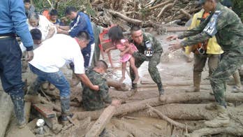 As Colombia death toll mounts, desperate quest for survivors