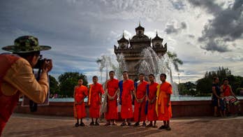 Rare focus on little-known Laos as it hosts major summit