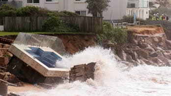 3 die in floodwaters as strong storm lashes Australia's east