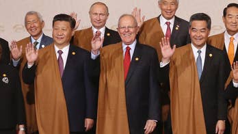 China's Xi affirms Hong Kong chief amid political challenges