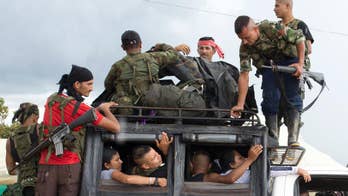 The Latest: Tight security ahead of Colombia peace ceremony
