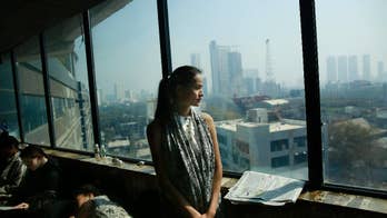 Boy from farm in Nepal has her big moment on Indian catwalk