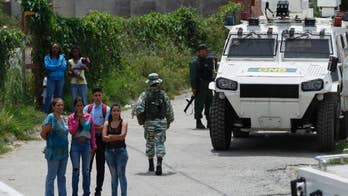 Venezuelans march to prison to demand freedom for activists