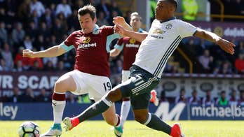 Martial, Rooney leads United to 2-0 win at Burnley in EPL