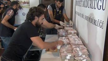Turkey: Dollar bills seen as evidence of coup-plotter links