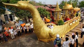 Golden urn holding Buddha relics returned to Cambodia shrine