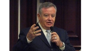 Florida Legislator Wears Passport to Work to Protest Arizona-Style Immigration Measures