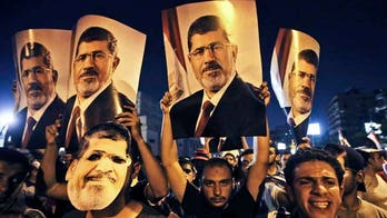 Egypt's former president Morsi to be tried for inciting violence, top prosecutor says