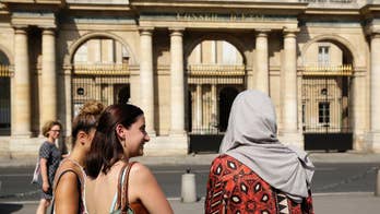The Latest: French top court overturns burkini ban