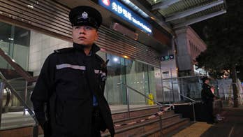 Hong Kong police arrest man after 13 injured in subway fire