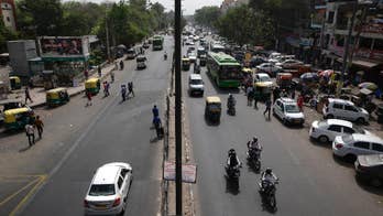 World's most polluted city limits cars to try clearing the air