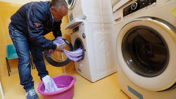 Pope Francis opens free laundromat for homeless