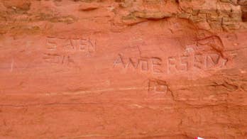 Large graffiti carved at Arches National Park in Utah