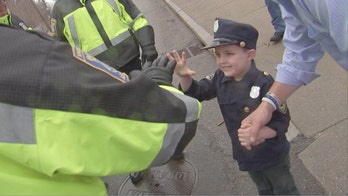 4-year-old gets star treatment as honorary Boston police officer