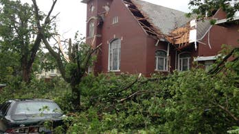 The Latest on severe weather: Severe storm damages homes, downs trees in Michigan