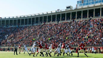 Naked student protesters delay Harvard-Yale game