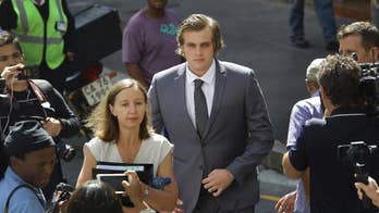 South African man, 22, in court for axe murder of his family