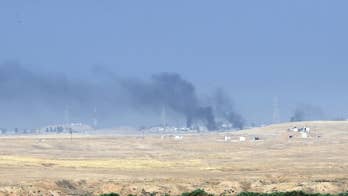 The Latest: Iraqi, Kurdish forces move east, south of Mosul