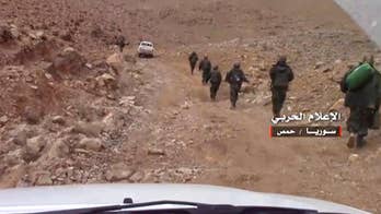 The Latest: Turkish troops to head to Manbij, target Kurds