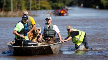 The Latest: hurricane-like winds still batter North Carolina