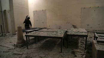 Rubble and ash in Mosul museum retaken from Islamic State