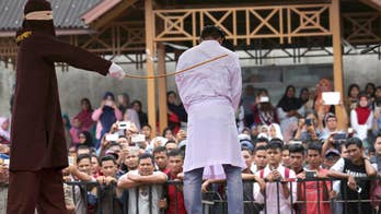 Gay couple in Indonesia's Aceh province face caning for sex