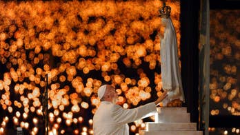 Pilgrims await pope at Fatima for canonization ceremony