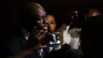 South Africa's new finance minister notes 'mutual suspicion'