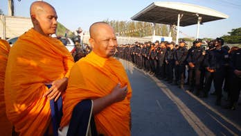 Thai police begin raid on Buddhist sect's temple