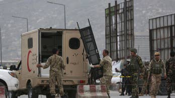 The Latest: Taliban launches attack on Afghan gov't agency
