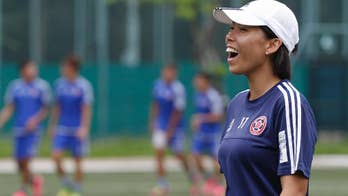 Female coach leads champion men's team in Hong Kong