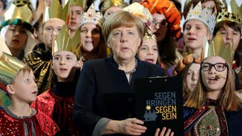 Merkel pledges national effort to return rejected migrants