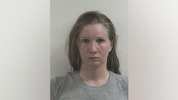 Innkeeper says she'll plead not guilty in racially charged assault case