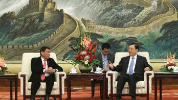 The Latest: China's Xi hails 'milestone' visit by Duterte
