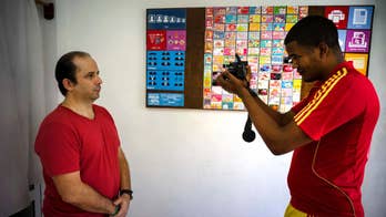 Hot new trend in Cuban ID photos: digital suits and blouses