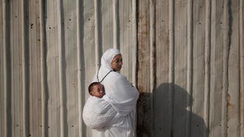 AP PHOTOS: The many faces of the female faithful at the hajj