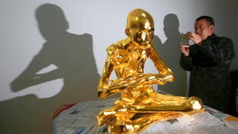 Revered Chinese monk is mummified and covered in gold leaf
