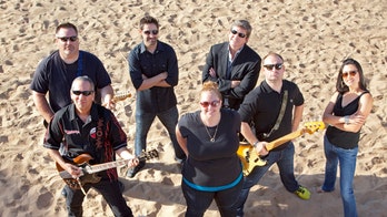 Relieving stress by turning the boardroom into a band room