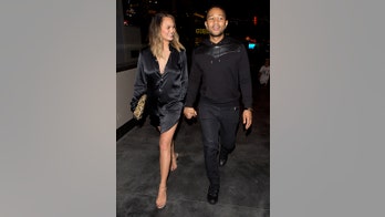 Chrissy Teigen wears negligee to Khloe Kardashian's birthday party