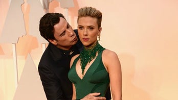 John Travolta and Scarlett Johansson share awkward Oscars moment